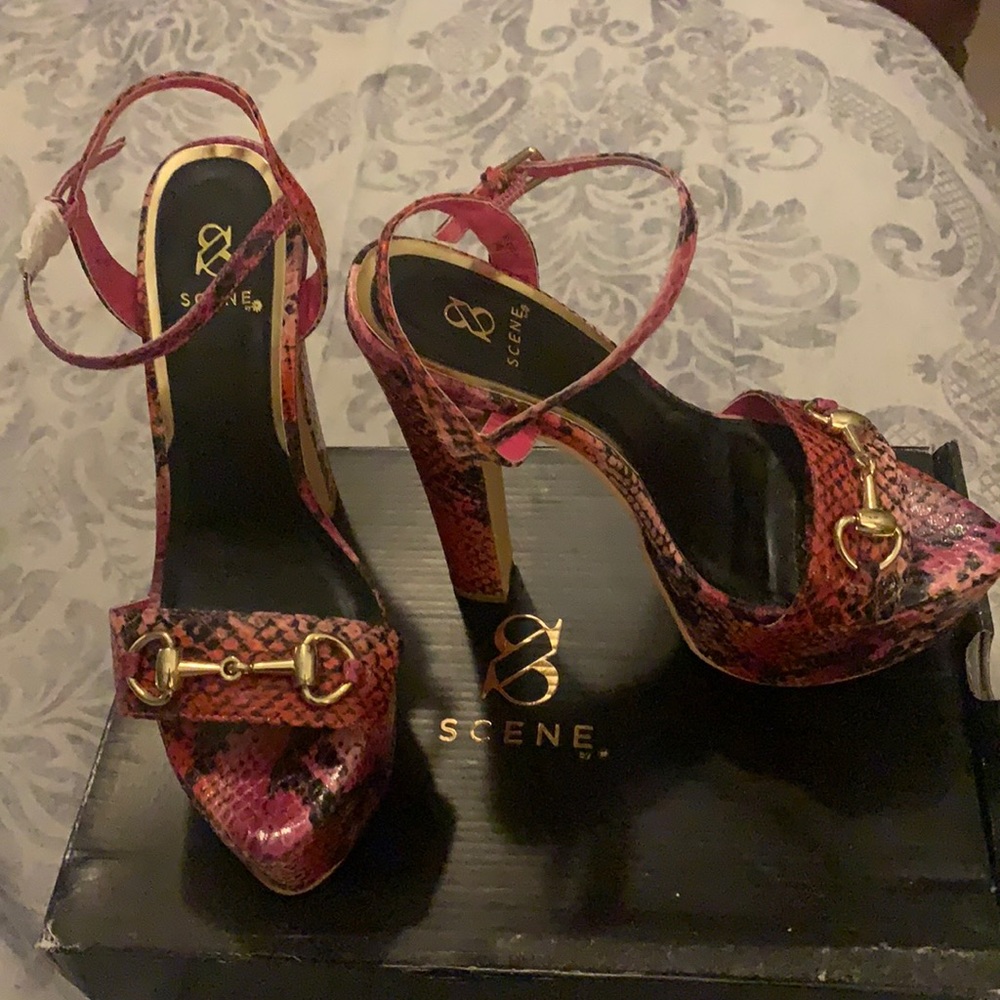 Pink snake print chunky heel platform stilettos.